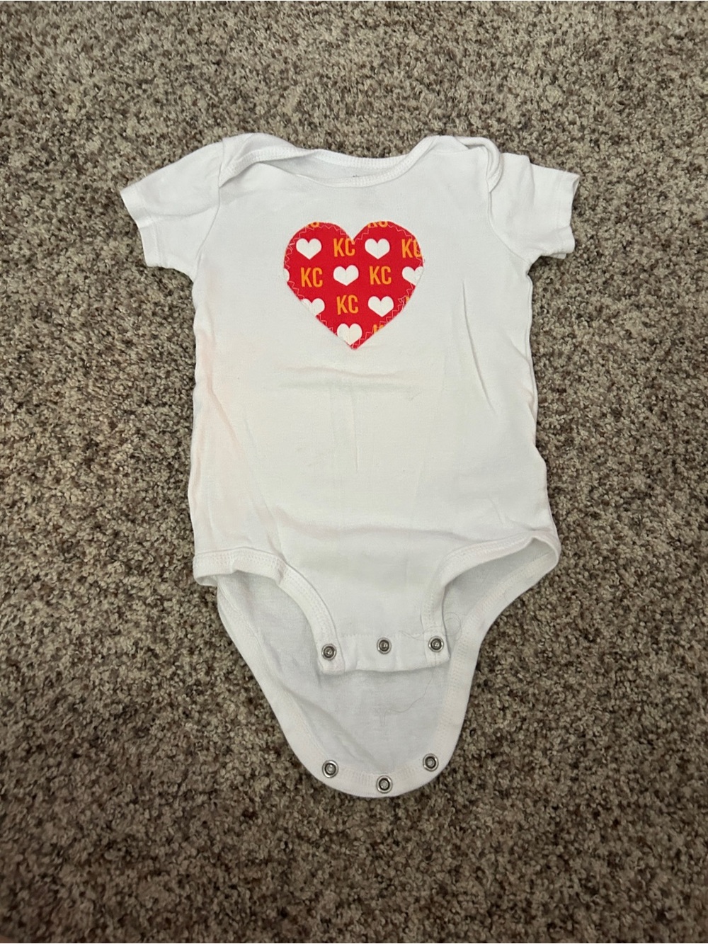 White Baby One-Piece Bodysuit with Red Heart KC Graphic